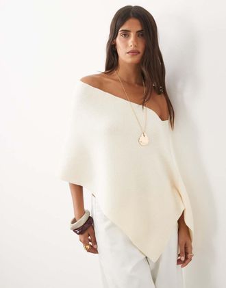 Lioness poncho asimmetrico lavorato a maglia in bianco