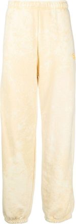Diesel embossed logo track pants - men - Polyester/Cotton - S - Yellow
