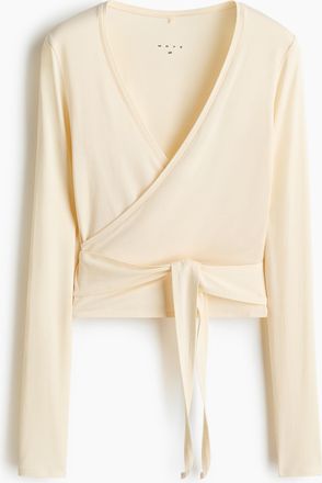 H&M Sportshirt im Wickelschnitt aus Modal - Buttergelb