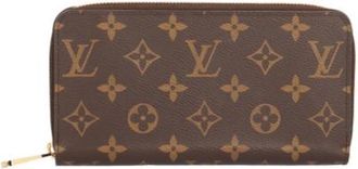 Louis Vuitton Pre-owned Monogram Lange portemonnee (bi-fold) - Dames - Vintage Accessoires - Bruin - ONE Size - Vintage
