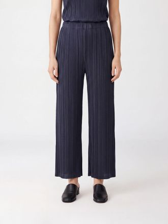 Pleats Please Issey Miyake Pantaloni a gamba larga in cr&ecirc;pe plissettato a vita alta