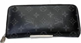 Louis Vuitton Pre-owned Wallets, male, Black, Size: ONE SIZE Pre-owned Zippy Wallet Vertical Monogram Long Wallet