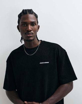 Pegador Pegador - Lagos - T-shirt oversize nera in tessuto a coste morbido con logo-Nero