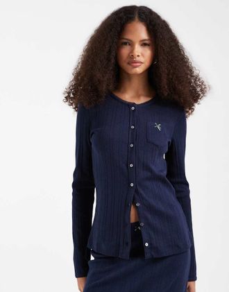 Lacoste Top a maniche lunghe traforato blu navy con bottoni in coordinato