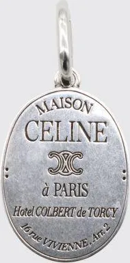 Celine Charms in ottone con logo