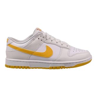 Nike Dunk Low Sneaker in White / University Gold Men Low-Top
