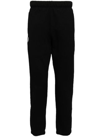 Aape By A Bathing Ape Moonface logo track pants - men - Cotton/Polyester - S - Black