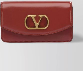 Valentino Garavani crossbody bags with gold-tone hardware and chain strap