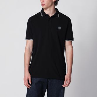 Stone Island Polo nera con patch logo Compass