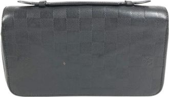 Louis Vuitton Pre-owned Clutches, female, Black, Size: ONE SIZE Pre-owned Damier Infini Long wallet (bi-fold)