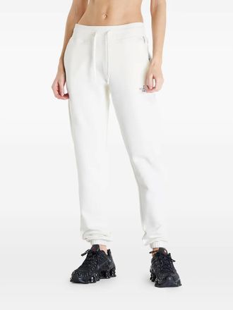 The North Face logo-embroidered track pants - women - Cotton - L - White