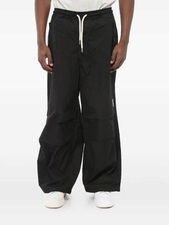 Giorgio Armani drawstring-waist flat-front trousers - men - Polyamide/Cotton - 46 - Black