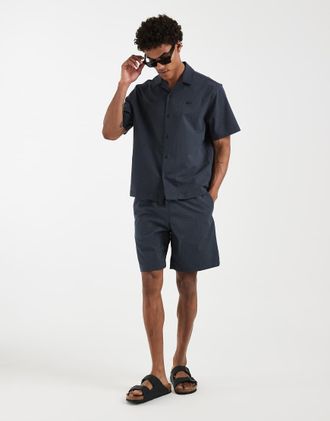 Lacoste Pantaloncini neri in seersucker in coordinato-Nero