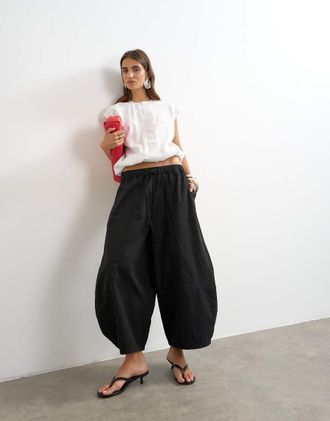 Topshop Pantaloni tecnici neri con motivo a ferro di cavallo-Nero