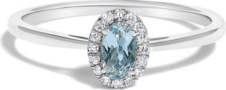 House of Brilliance 10K White Gold Oval and Diamond Accent Halo Birthstone Ring in Blue Aquamarine at Nordstrom, Size 6.5