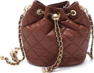 Adornia Cushion Quilted Faux Leather Bucket Bag in Brown at Nordstrom Rack