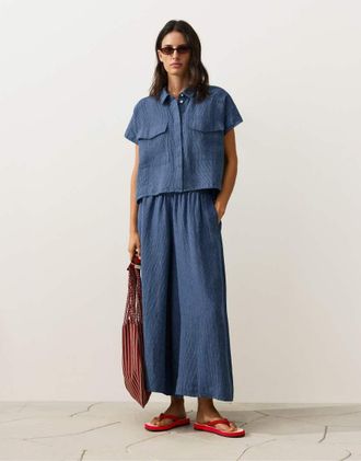 Oysho Pantaloni cropped a fondo super ampio 100% lino blu
