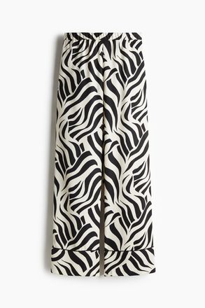 H&M Twillhose in Loose Fit - Schwarz/Gemustert