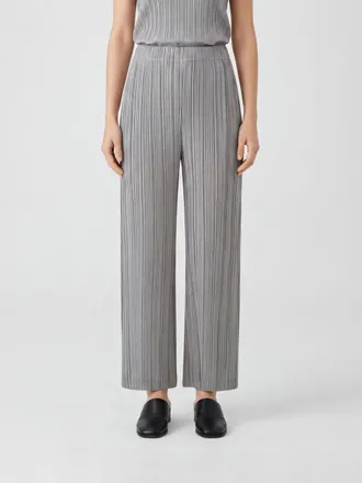 Pleats Please Issey Miyake Pantaloni a gamba larga in cr&ecirc;pe plissettato a vita alta