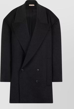 The Mannei wool longline coat button detail