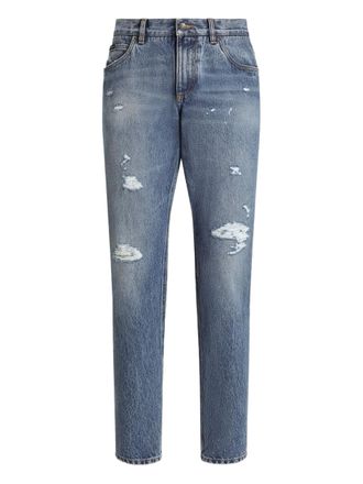 Dolce & Gabbana distressed logo-plaque jeans - men - Cotton - 56 - Blue