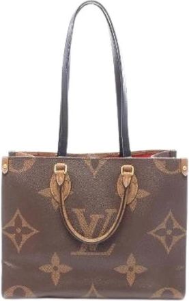 Louis Vuitton Pre-owned On The Go MM Monogram Giant Reverse Tote Bag - Dames - Vintage Shopper - Bruin - ONE Size - Leer - Vintage