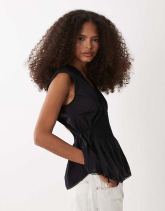 Arket Top peplo senza maniche stretto nero