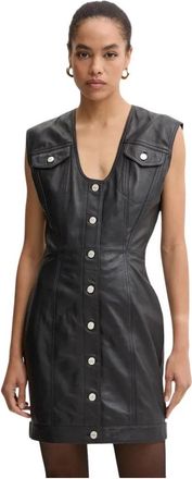 Moschino Short Kleedjes - Dames - Korte kleedjes - Zwart - M - Leer - Kleedjes