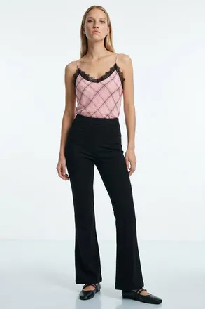 Exquise High Waisted Flared Knit Trousers in Black at Nordstrom, Size Medium