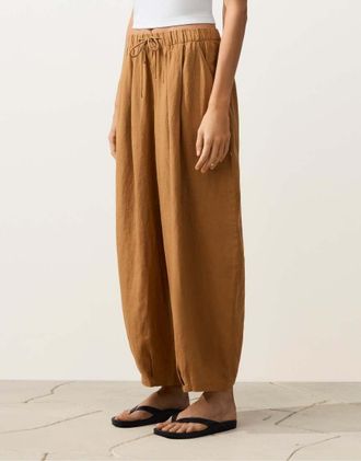 Oysho Pantaloni a palloncino 100% lino color senape a pieghe-Giallo