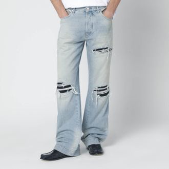 Amiri Ripped Jeans In Mist Indigo
