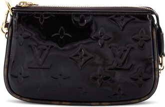 Louis Vuitton Pochette Accessoires Monogram Vernis with Monogram Canvas Mini clutch bag - Bruin