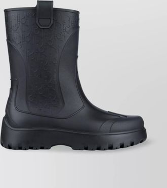 Dior round toe rubber sole pull tab boots