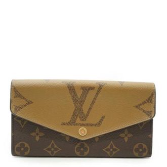 Louis Vuitton Pre-owned Portefeuille Sarah Bruin Canvas Leren Portemonnee - Dames - Pre-owned - Bruin - Maat: ONE Size Leer