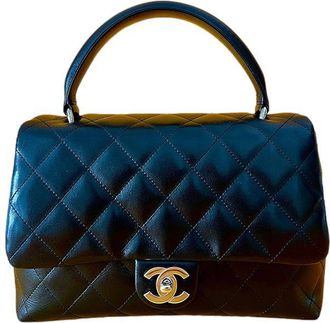 Chanel Vintage black leather quilted bag