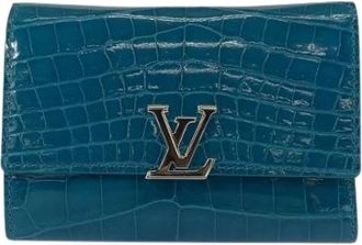 Louis Vuitton Pre-owned Crocodile Capucines Compact Portemonnee - Dames - Vintage Accessoires - Blauw - ONE Size - Leer - Vintage