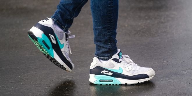 A guest wears a pair of blue and white Nike Air Max's