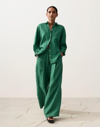 Oysho Pantaloni 100% lino a fondo ampio verdi-Verde