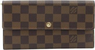 Louis Vuitton Pre-owned Lange Portemonnee (bi-fold) - Dames - Vintage Accessoires - Bruin - ONE Size - Leer - Vintage