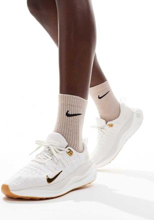 Nike Infinity Run sneakers in off white