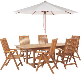 Beliani Set Di Tavolo E 6 Sedie Da Giardino Con Ombrellone Legno Di Acacia Java