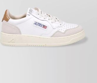 Autry low sneaker with rubber sole and perforated detailing