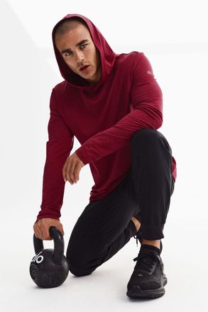 Alo | Conquer Reform Long Sleeve With Hood Top in Garnet, Size: Medium