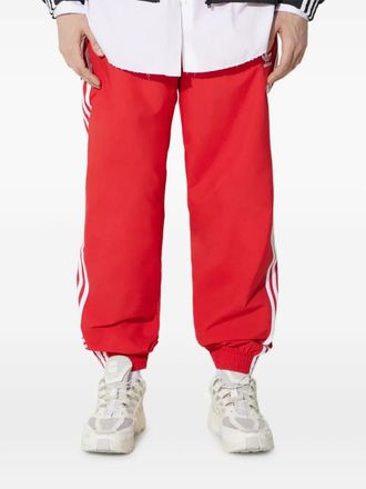 adidas three-stripe track pants - men - Recycled Nylon - L - Red