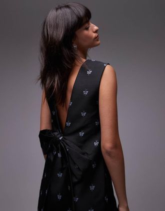 & Other Stories low bow back mini dress in black with embroidered butterflies
