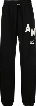 Amiri Hockey logo-patch track pants - men - Cotton/Lyocell - XXXL - Black