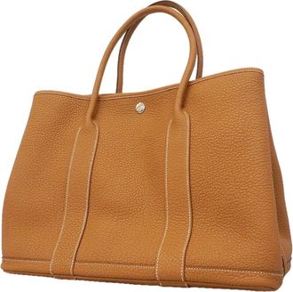Herm&egrave;s Gold Negonda Leather Tote Bag (Pre-Owned)