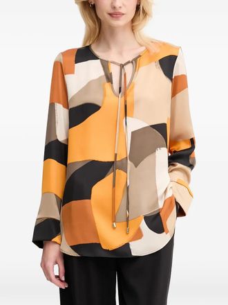 Joseph Ribkoff Blouse met geometrische patroon en gestrikte kraag - Oranje