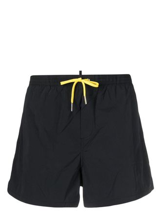 Dsquared2 x Pac-Man logo-print swim shorts - men - Elastane/Polyamide - 46 - Black