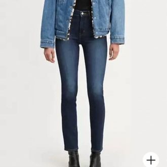 Levi's 724 High Rise Straight Jeans In Blue